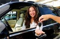 woman buying a car (select to view enlarged photo)